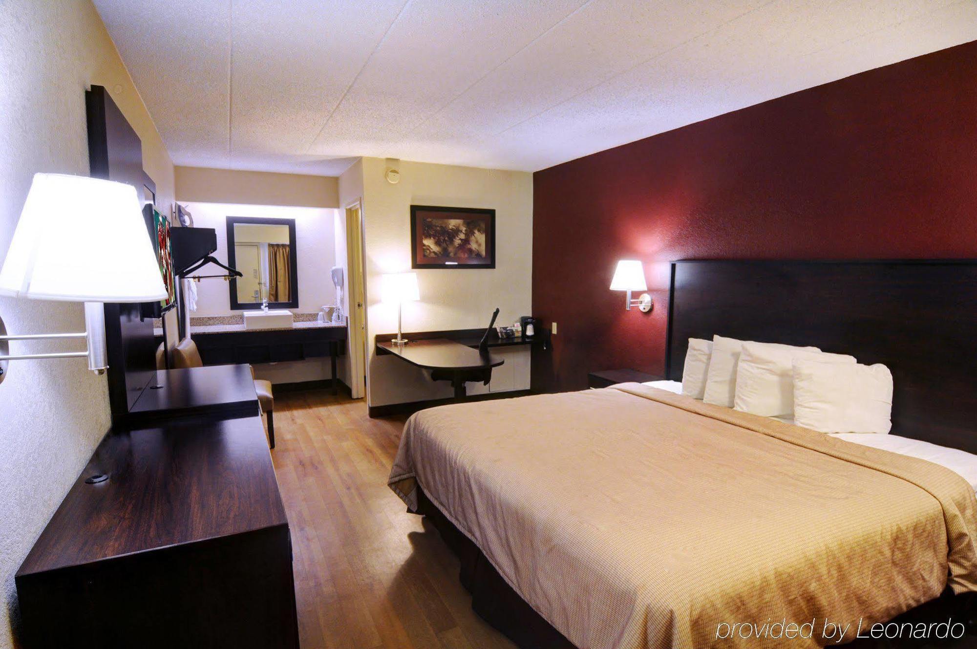 American Inn & Suites Bishop Airport Flint Extérieur photo