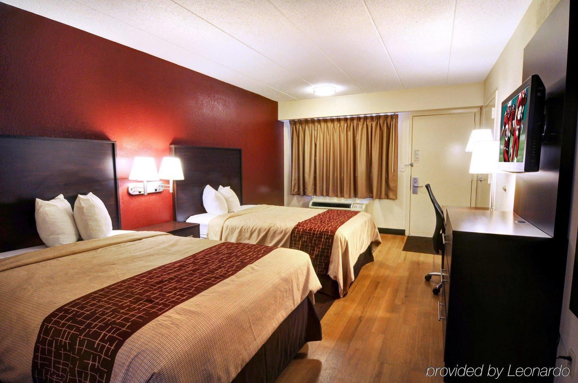 American Inn & Suites Bishop Airport Flint Extérieur photo